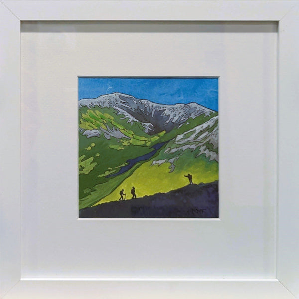 A framed watercolor and ink painting depicting the silhouettes of three hikers climbing on the Presidential Range with Mount Washington in the background.