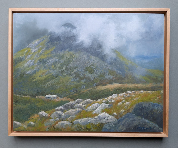 Framed painting of Madison Spring Hut with clouds sweeping over Mount Madison above. White Mountains, New Hampshire.