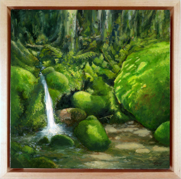"Deep in Mossy Woods" is a 10 by 10 inch oil painting on panel by Rebecca M. Fullerton, depicting a tiny waterfall cascading through sun-dappled bright, emerald green moss growing over boulders and roots in the forest.