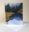 There are many 'notches' in the White Mountains of New Hampshire. Pinkham Notch is a gorgeous spot surrounded by tall peaks and full of trails. Sit quietly beside one of the many ponds around here and you may just spot a moose, ducks, pine martens, a beaver, and other woodland critters. Small blank greeting cards. Envelopes are included.