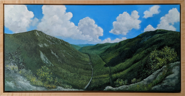 "Mount Willard, Summer" is a 20 by 40 inch framed oil on canvas painting by Rebecca M. Fullerton depicting the view over Crawford Notch from Mount Willard in the heart of New Hampshire's White Mountains. This artwork depicts mountains, valleys, forests, cliffs, trees, roads, railroad tracks, clouds, blue sky and summertime.
