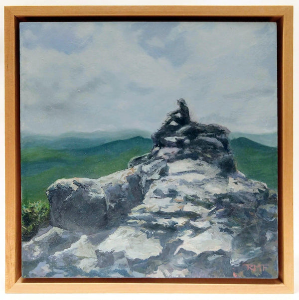 This is a framed view of "Outcrop II," an18 by 8 inch oil on panel painting by Rebecca M. Fullerton. It depicts a craggy rock outcrop along the Franconia Ridge Trail between Mount Lincoln and Mount Lafayette above Franconia Notch in New Hampshire's White Mountains. A lone hiker sits on top, looking out at the view.