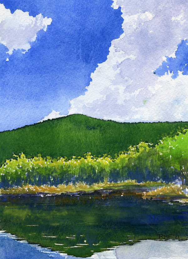 "Summer Idyll" is a 5 by 7 inch watercolor and ink painting by White Mountains artist Rebecca M. Fullerton, depicting a hill and puffy clouds reflected in a mountain pond.